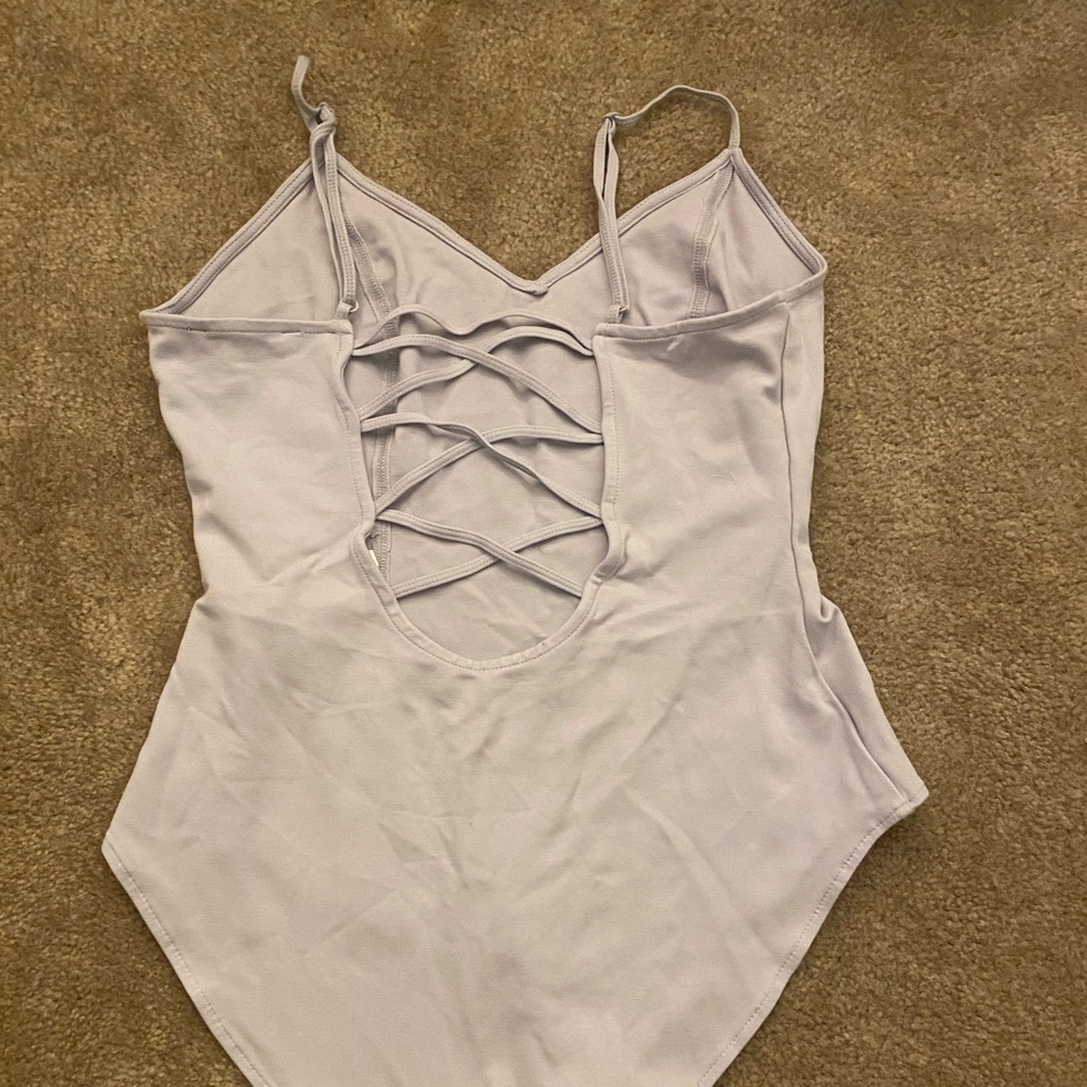 Buttoned ballet body suit